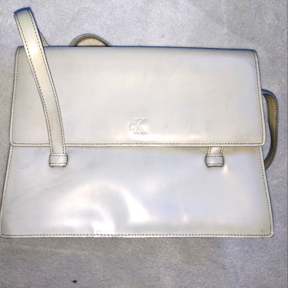 CK light teal purse